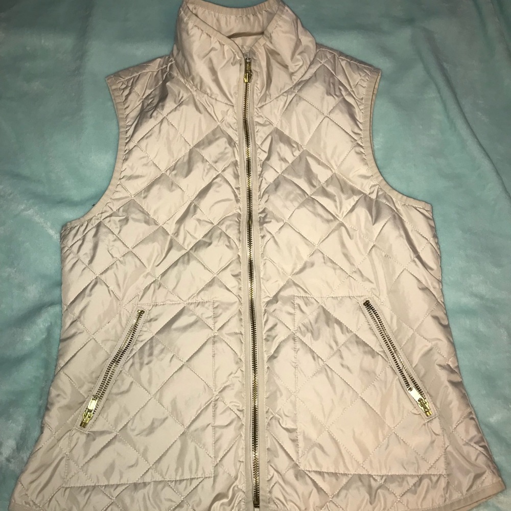 Cream colored vest!